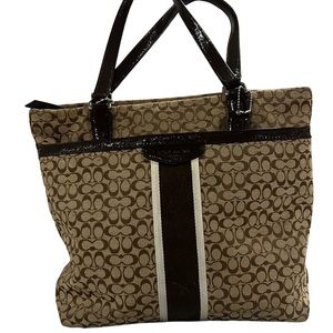 Coach Medium size brown canvas handbag.